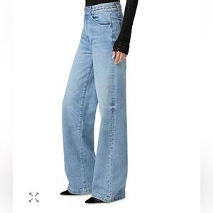 NWT. Retail $299. Size 27. PAIGE Light Blue Jeans. High Rise wide leg.